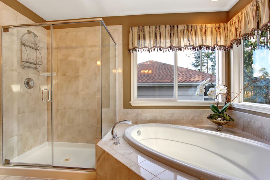 Bathroom with new tub and shower fixtures Bathroom with new tub and shower fixtures